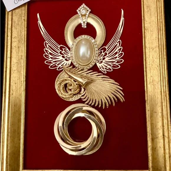 Sister angels, Lisa and Grace created from broken down Jewelry set on red velvet